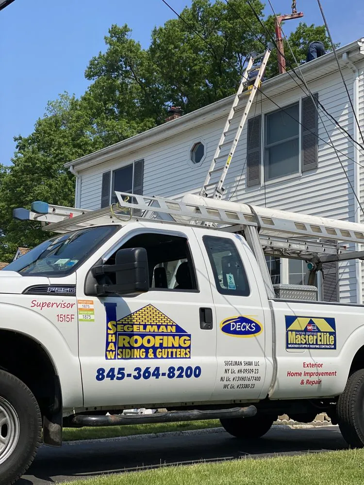 Slide of Rockland Roofing