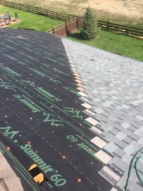 Slide of Rock's Roofing