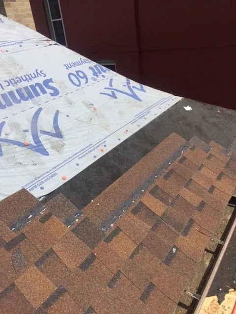 Slide of Rock's Roofing