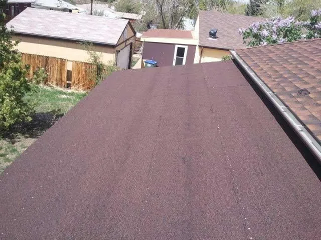 Slide of Rock's Roofing