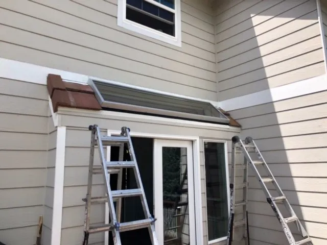 Slide of Rock's Roofing