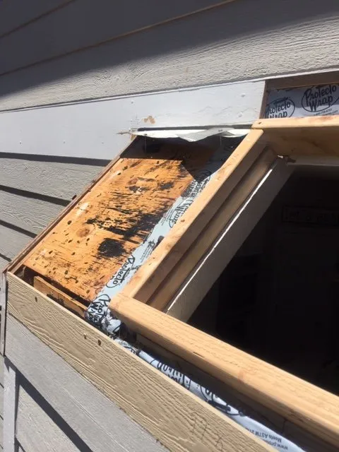 Slide of Rock's Roofing