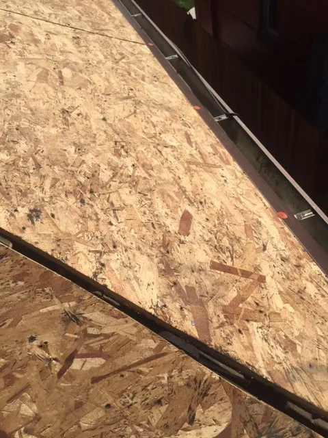 Slide of Rock's Roofing