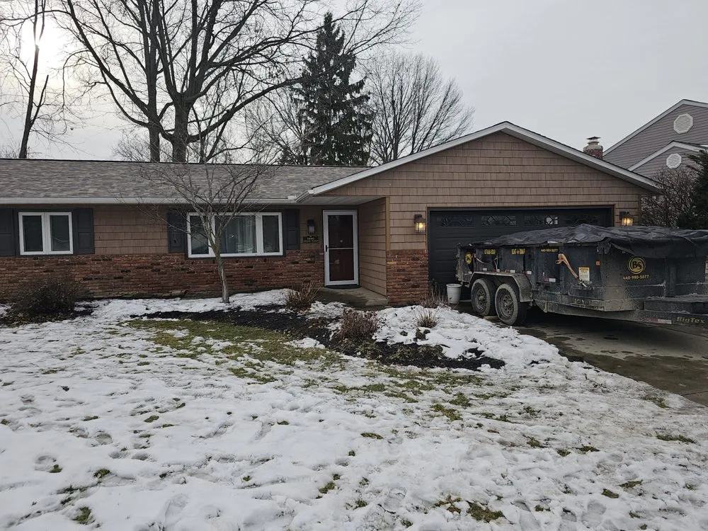 Slide of Rockstar Roofing