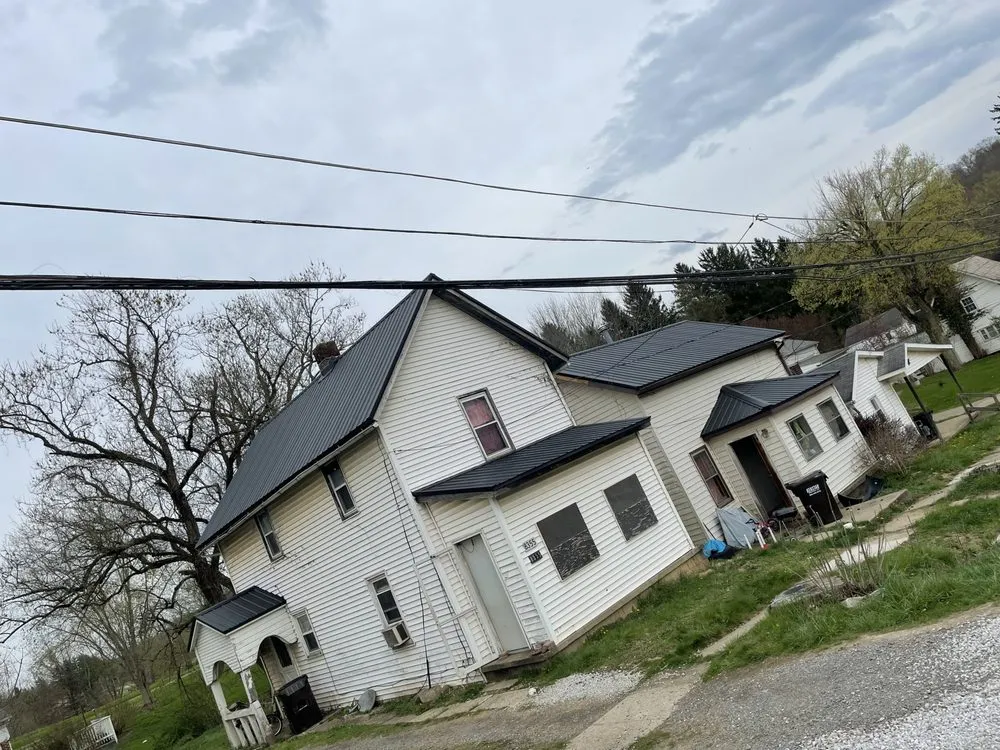 Slide of Rocky Fork Roofing