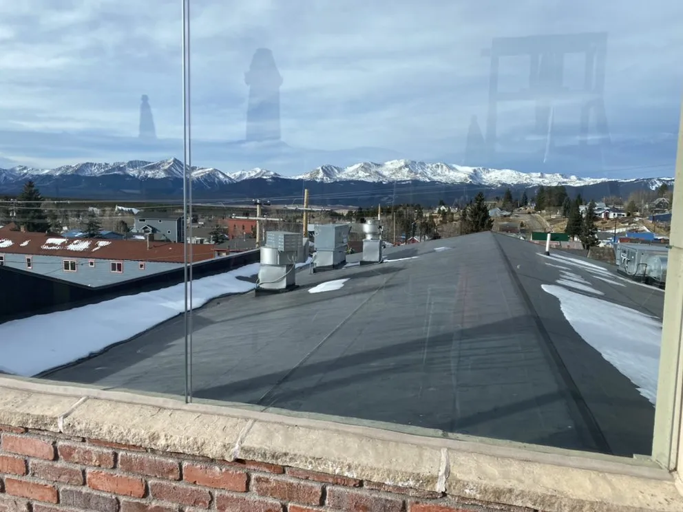 Slide of Rocky Mountain Roofers