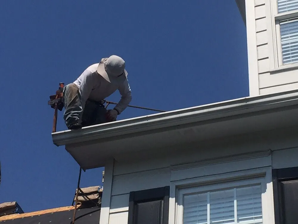 Slide of Rocky Mountain Roofing Company