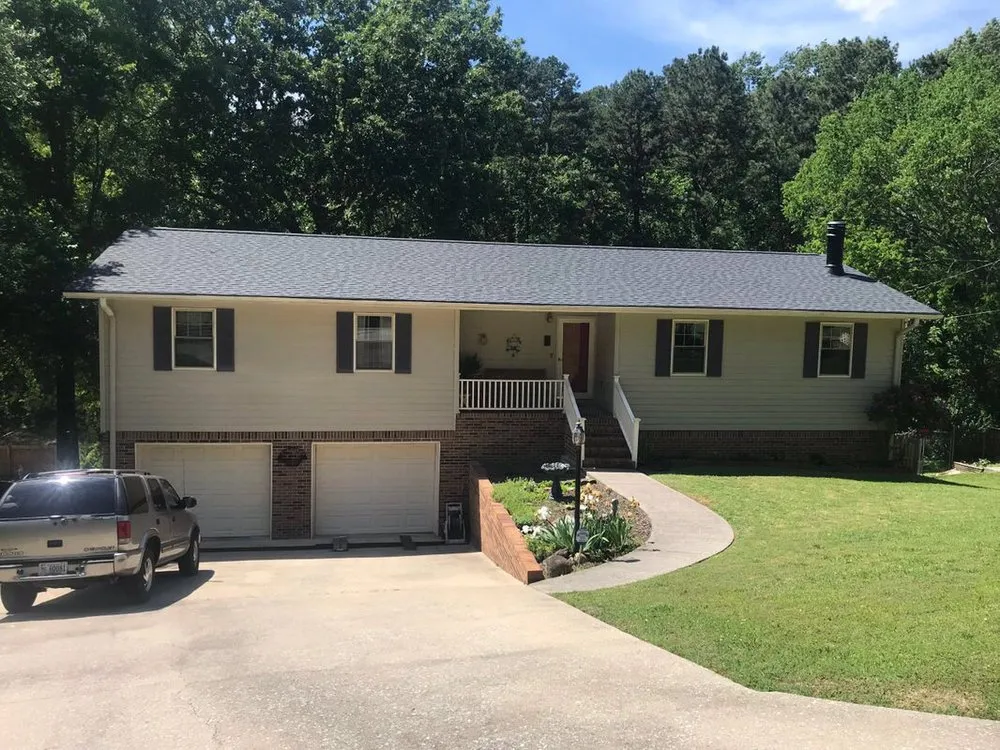 Slide of Rocky Top Roofing