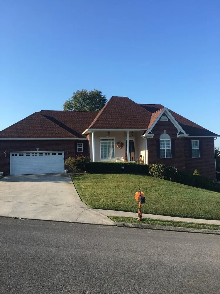 Slide of Rocky Top Roofing