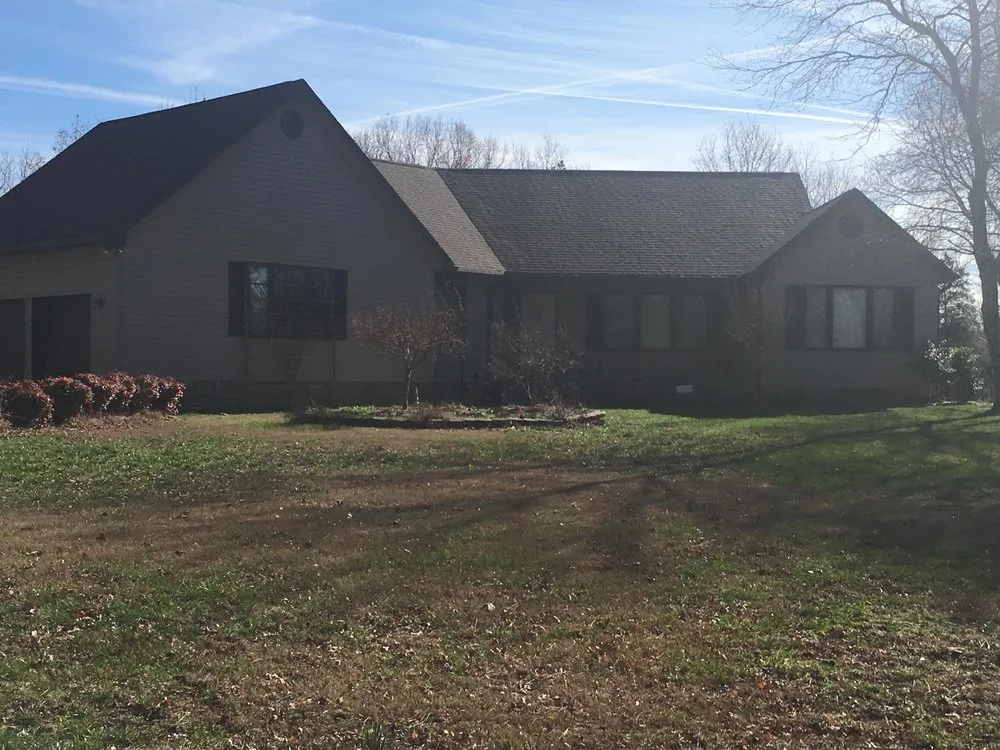 Slide of Rocky Top Roofing