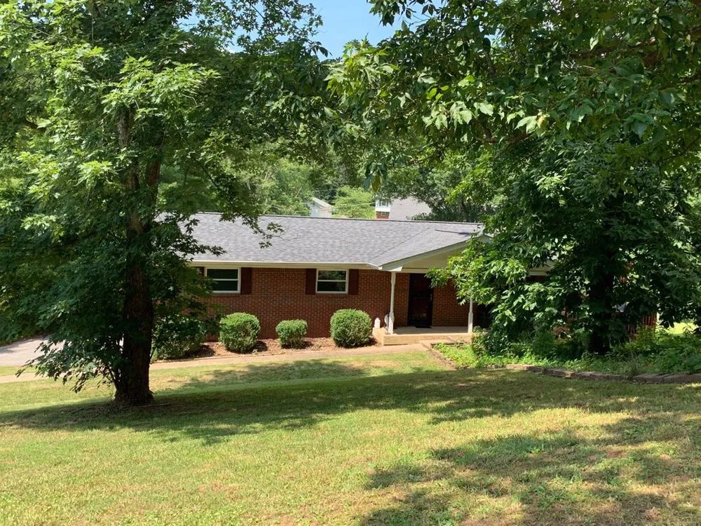Slide of Rocky Top Roofing