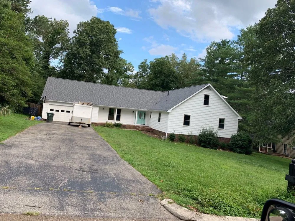 Slide of Rocky Top Roofing