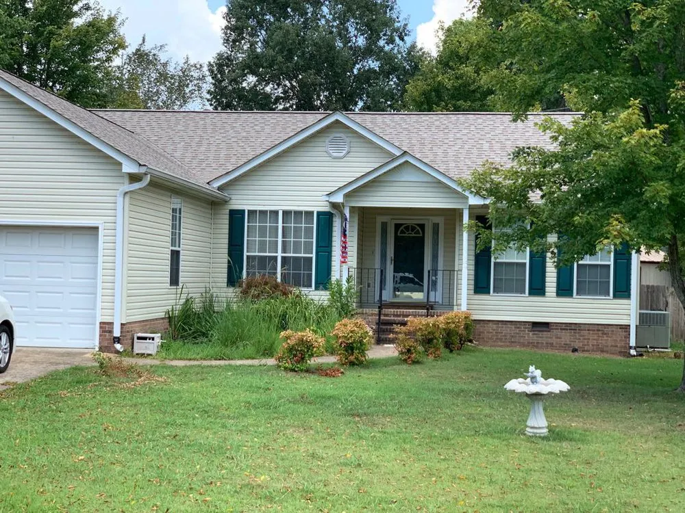 Slide of Rocky Top Roofing