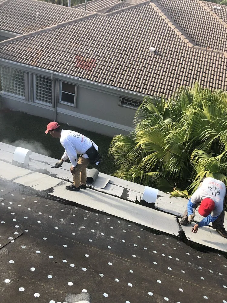 Slide of Rocky's Roofing