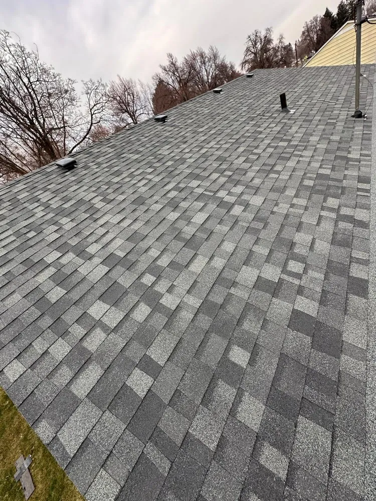 Slide of Rodas Roofing and Construction