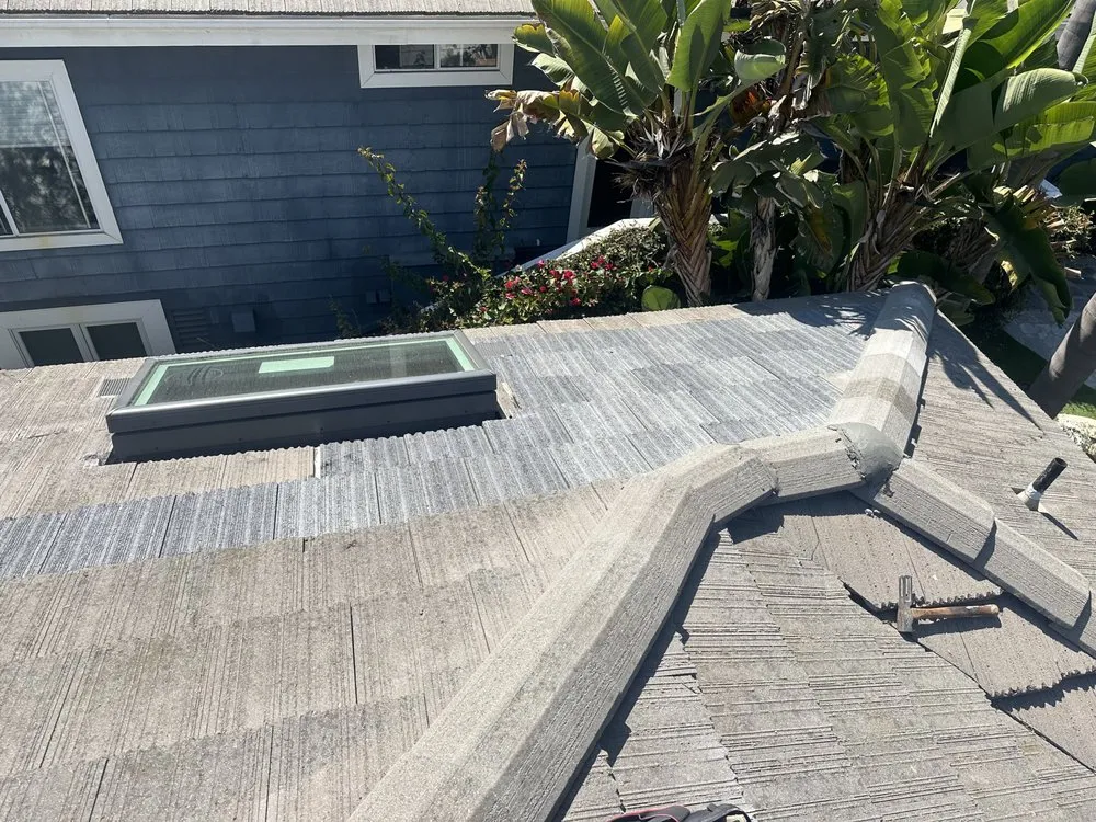 Slide of Rod's Roofing