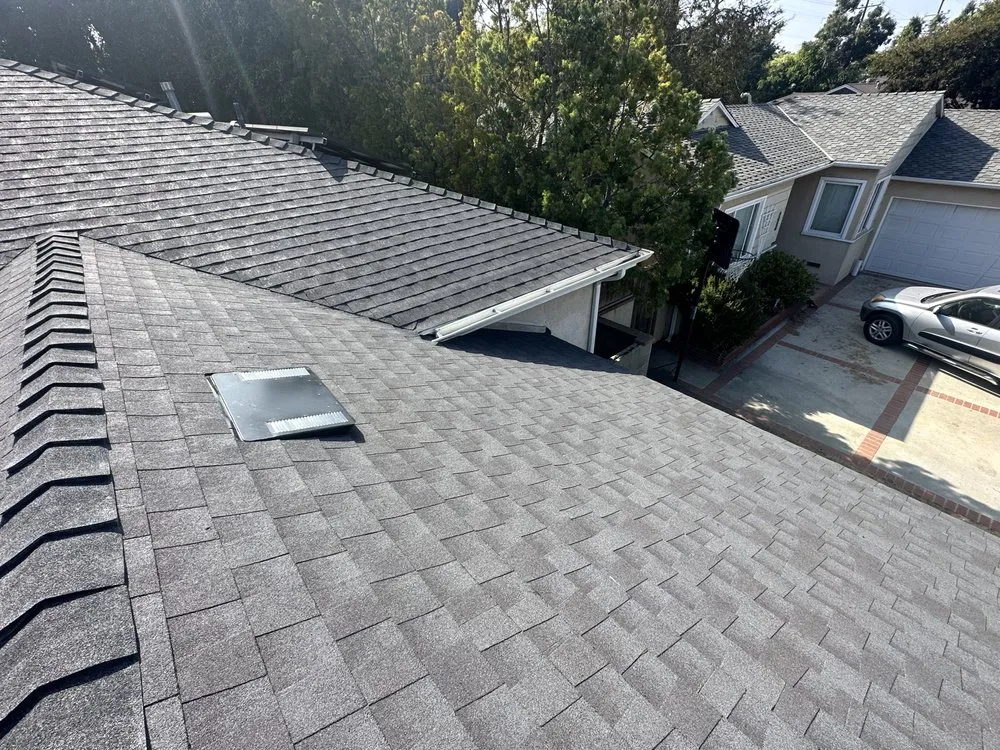 Slide of Rod's Roofing