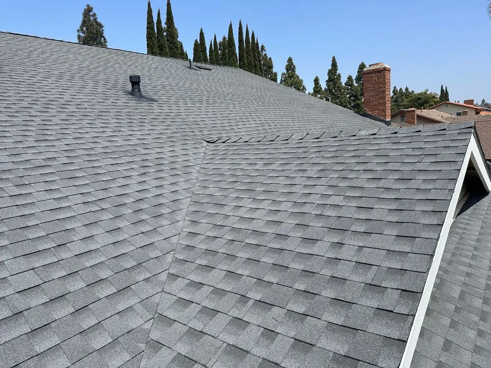 Slide of Rod's Roofing