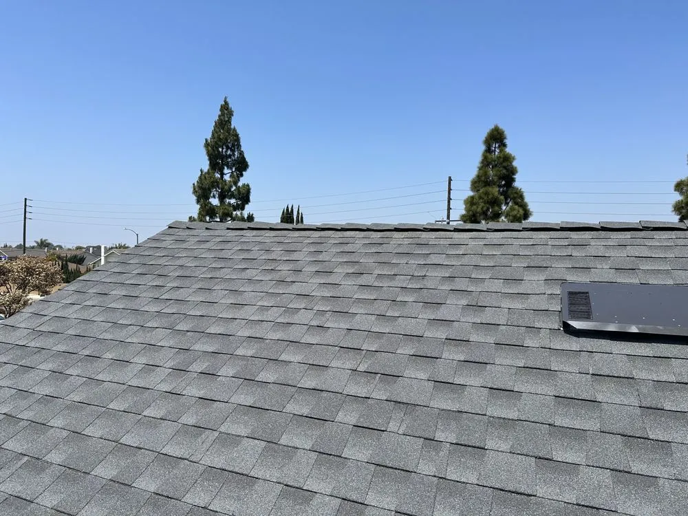 Slide of Rod's Roofing