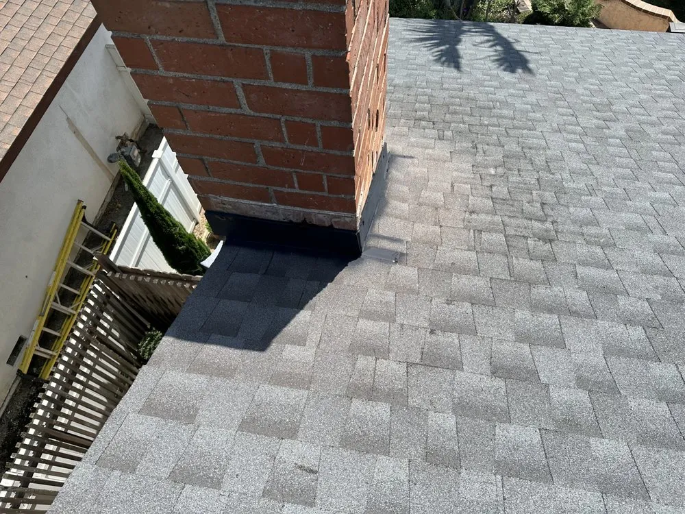 Slide of Rod's Roofing