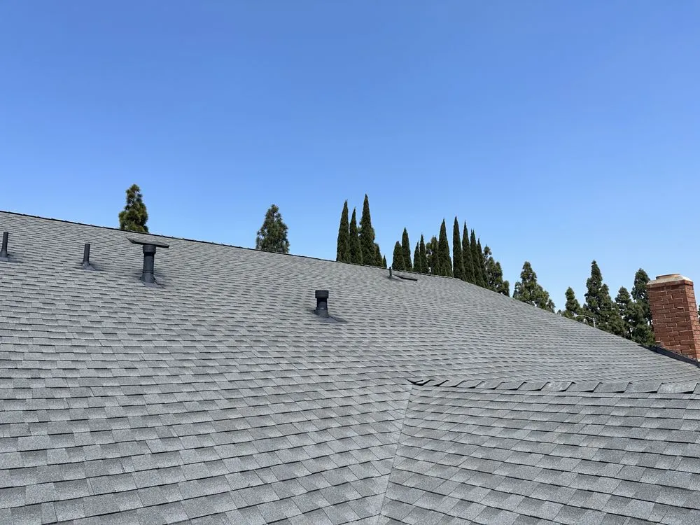 Slide of Rod's Roofing