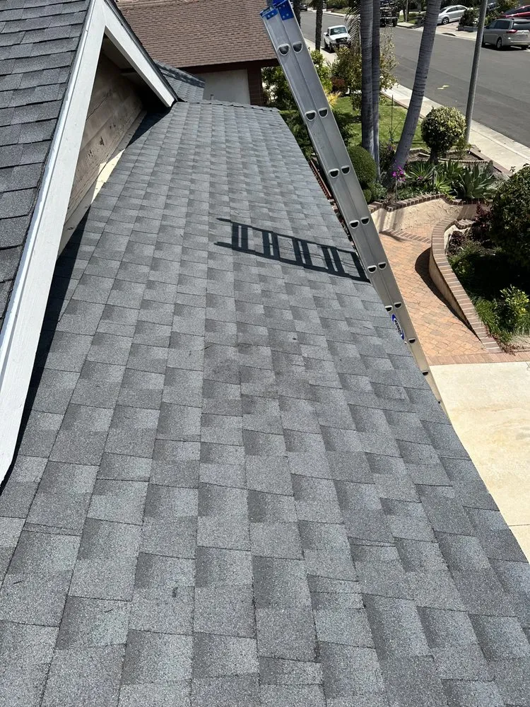 Slide of Rod's Roofing