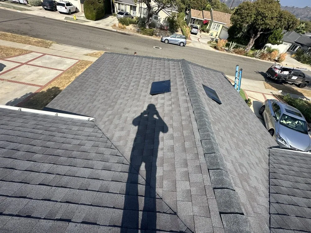 Slide of Rod's Roofing