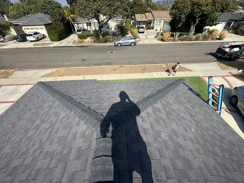 Slide of Rod's Roofing