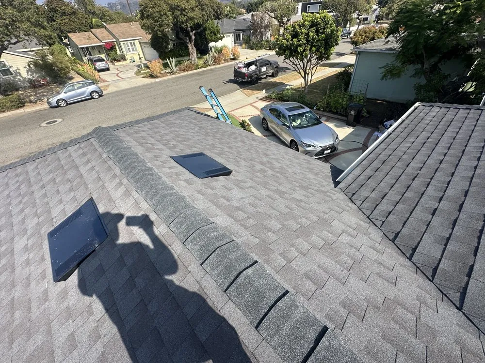 Slide of Rod's Roofing