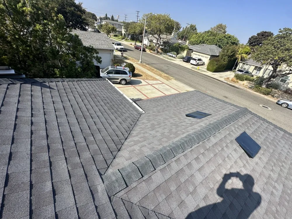 Slide of Rod's Roofing