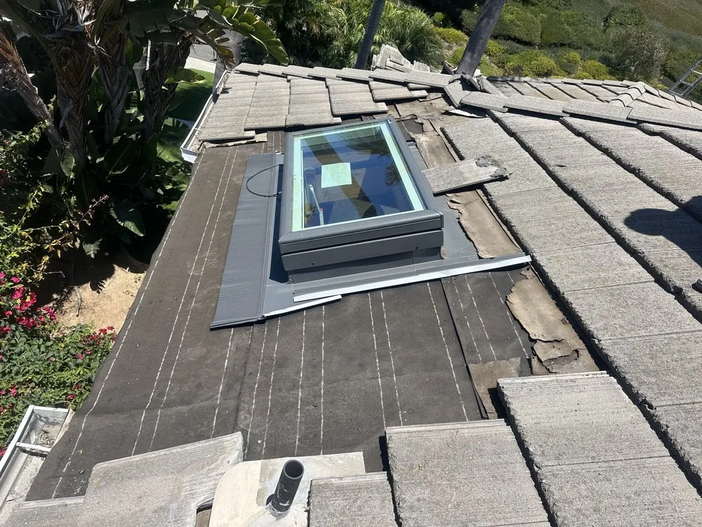 Slide of Rod's Roofing