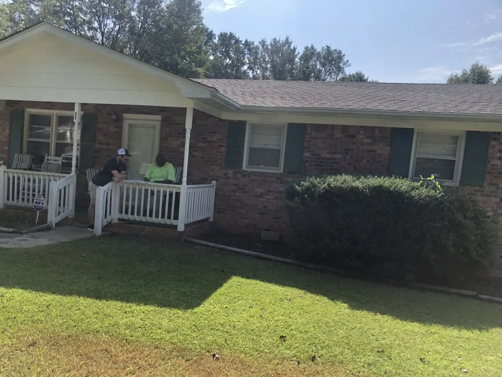 Slide of Roebuck Roofing