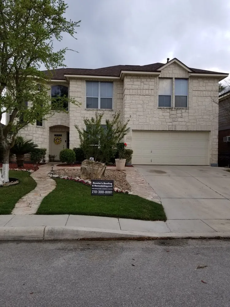 Slide of Roesler's Roofing & Remodeling