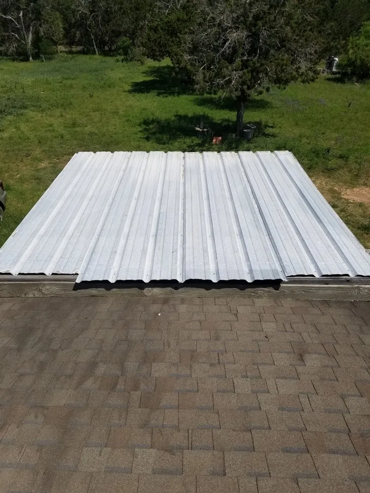 Slide of Roesler's Roofing & Remodeling