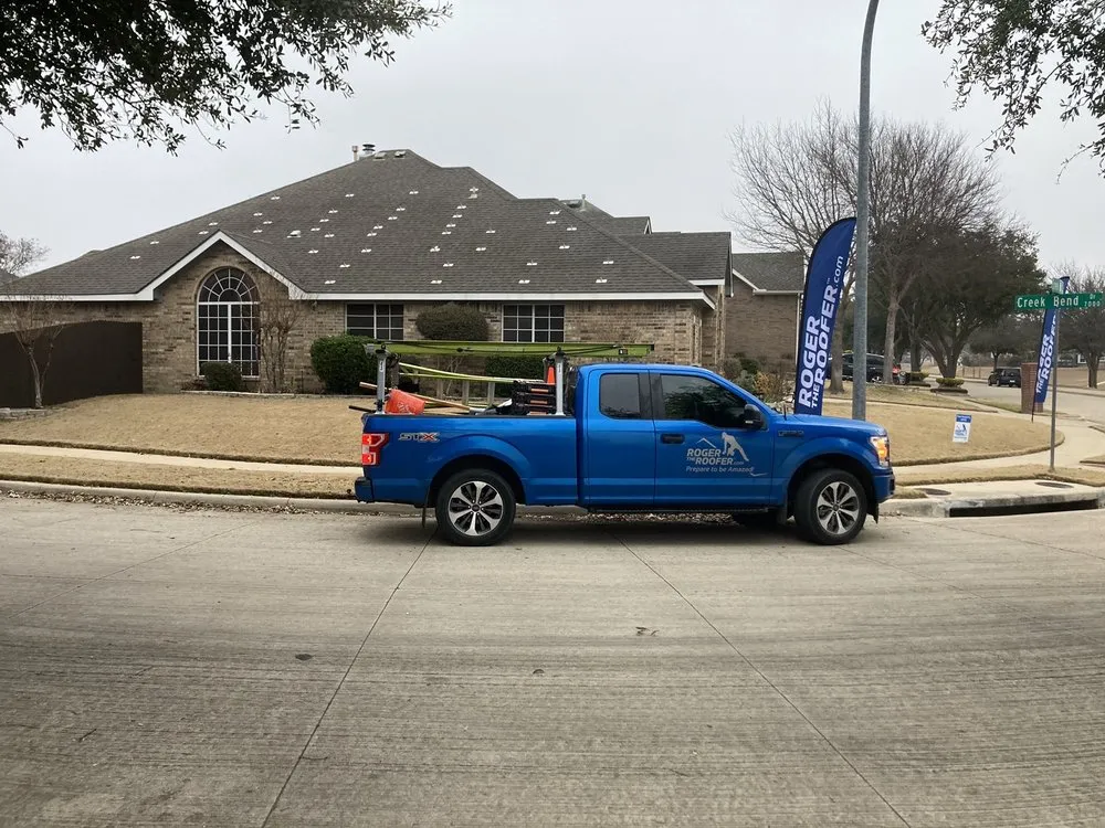 Slide of Roger The Roofer