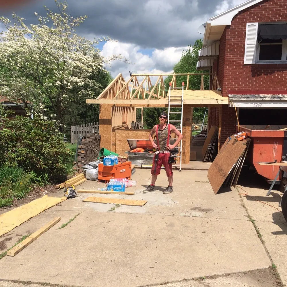 Slide of Roger's Roofing & Remodeling