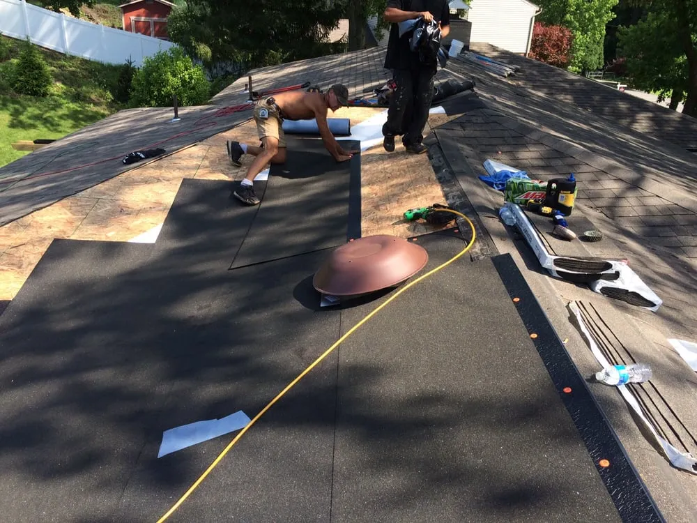 Slide of Roger's Roofing & Remodeling