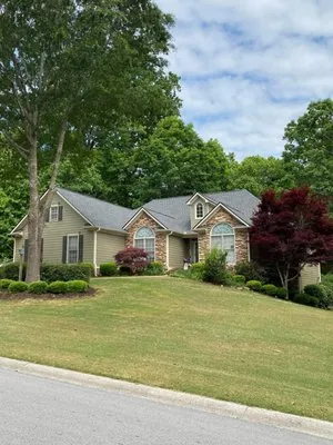 Rogers Roofing And Construction Logo