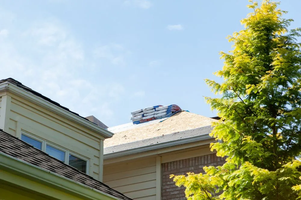 Slide of Rogers Roofing