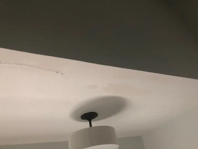 Slide of Rogers Roofing