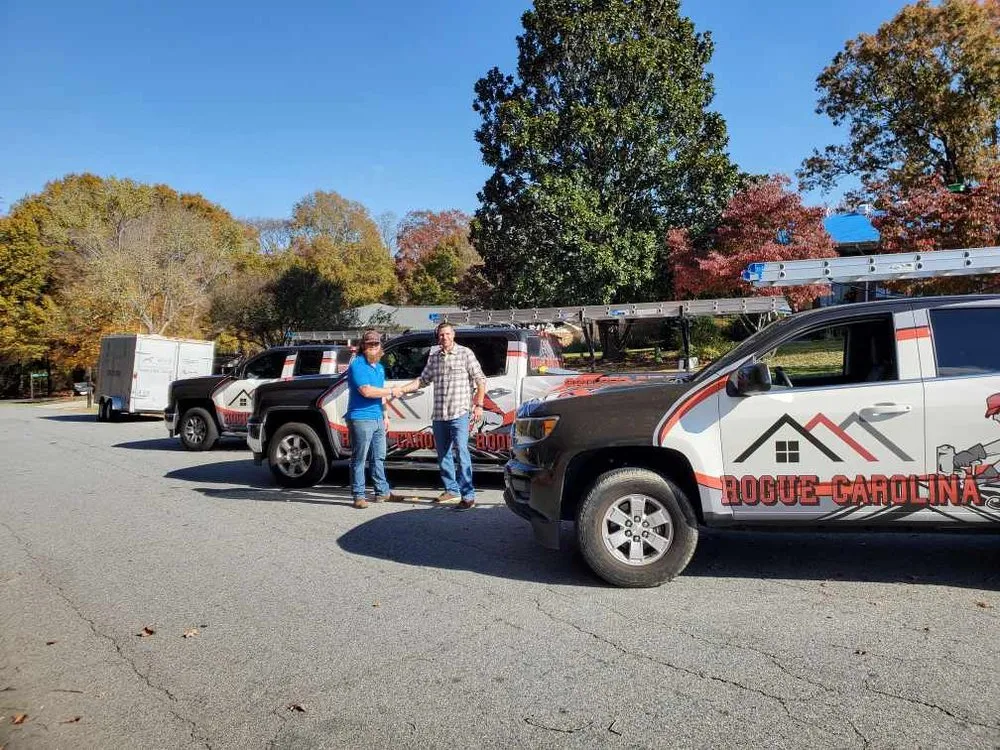 Slide of Rogue Carolina Roofing