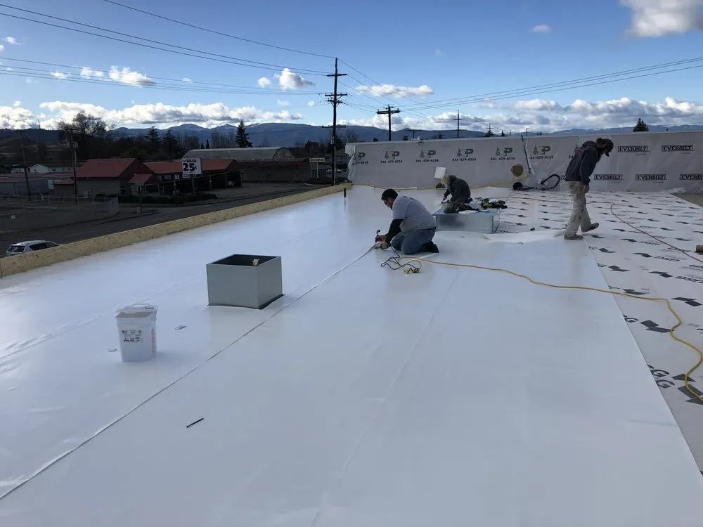 Slide of Rogue Valley Roofing
