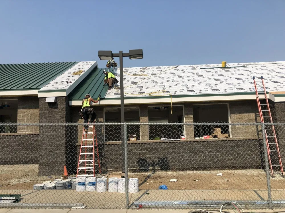 Slide of Rogue Valley Roofing