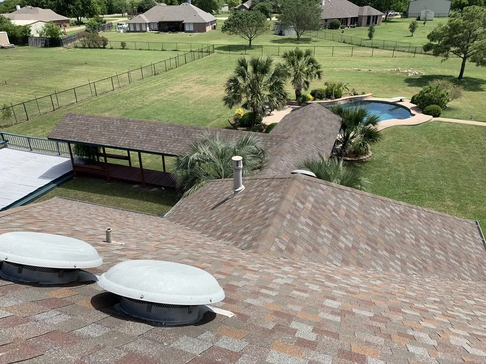 Slide of R.O.I. Roofing & Construction