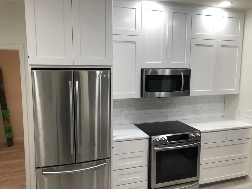 Slide of R.O.I. Roofing & Construction