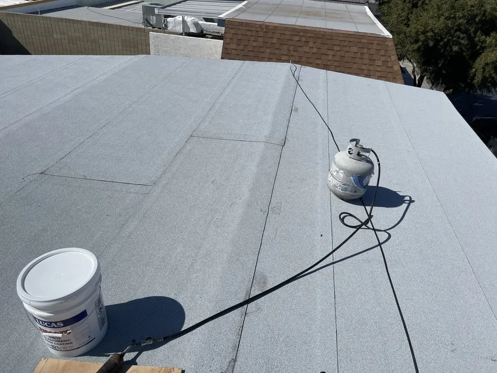 Slide of Rojas Roofing