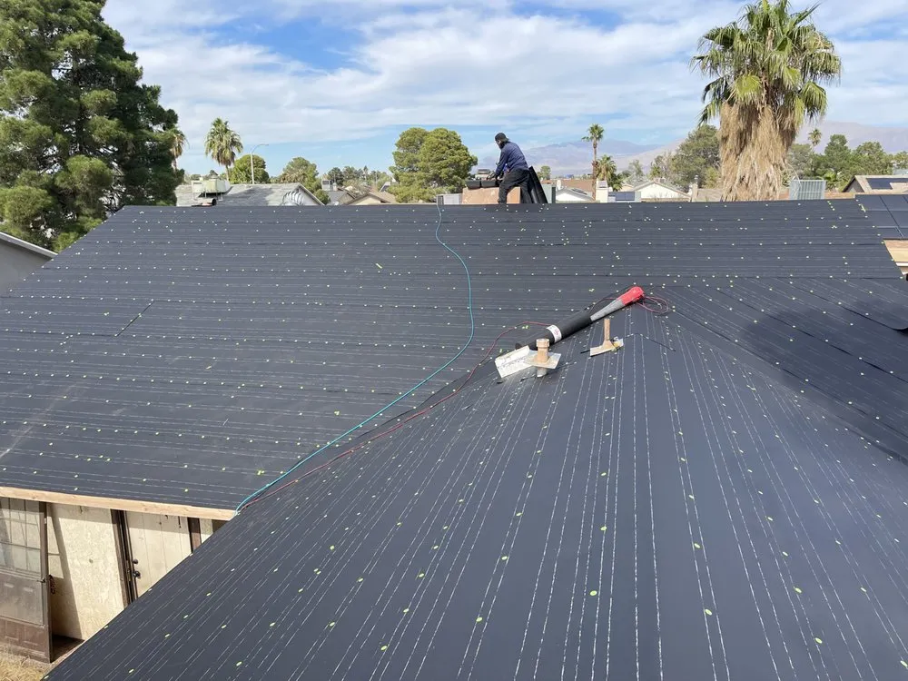 Slide of Rojas Roofing