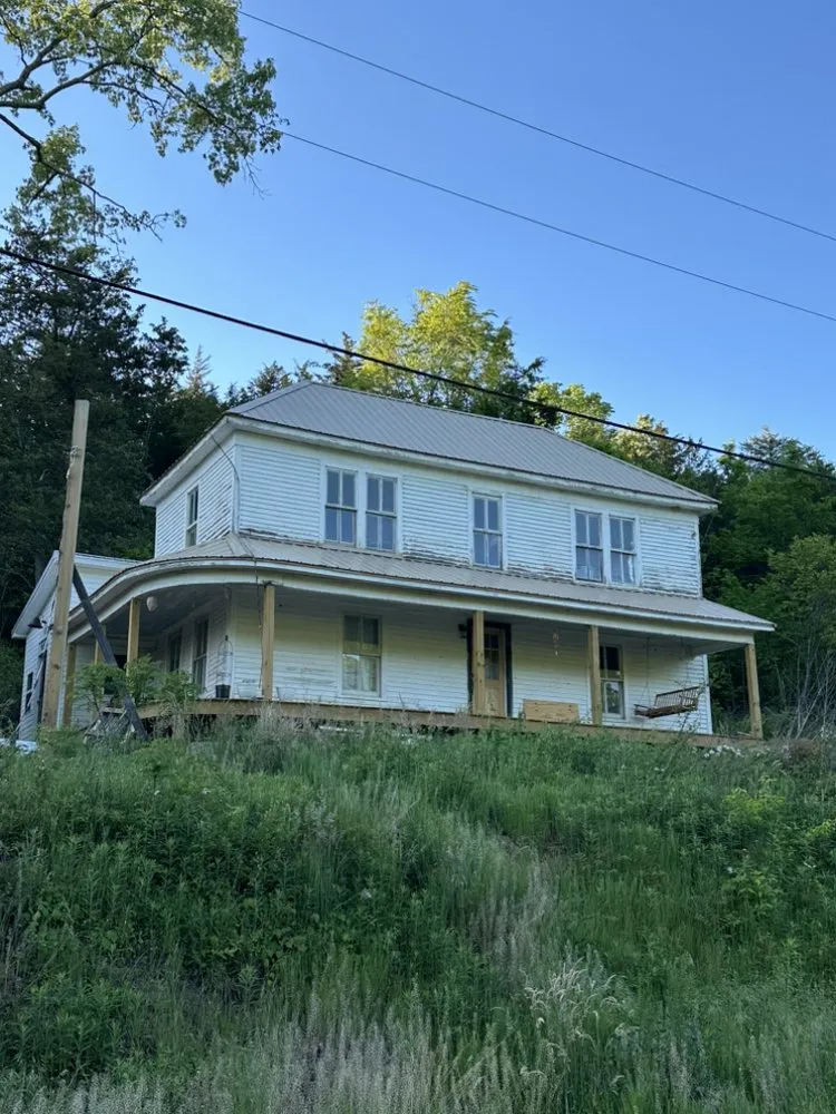 Slide of Rolando Roofing