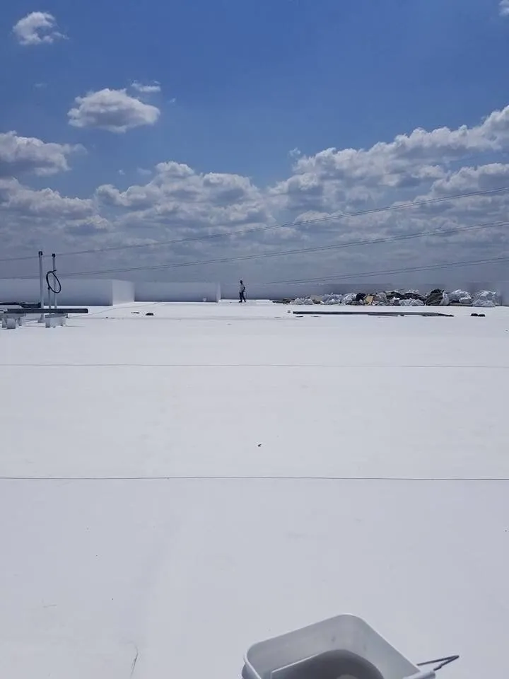 Slide of Roland's Roofing