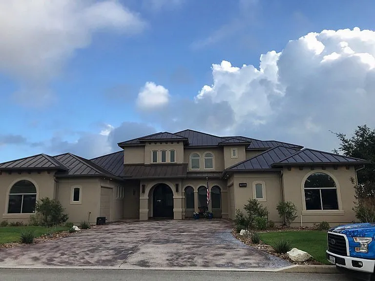 Slide of Roland's Roofing